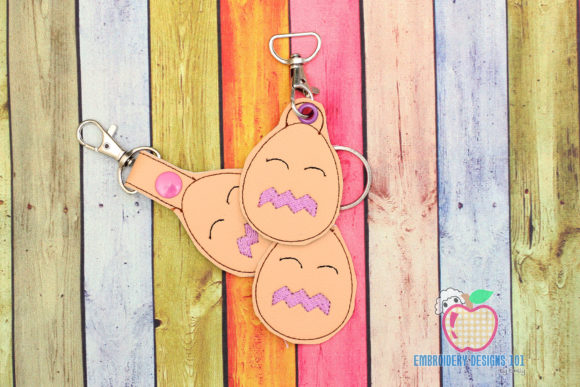A Cartoon Egg ITH KeyFob Snaptab Review for Seasonal Collections